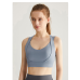 Спортивний кроп топ бюстгальтер на застібках сіро-блакитний топ бра
