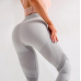 Безшовний комплект спортивний легінси і топ пуш ап світло сірий